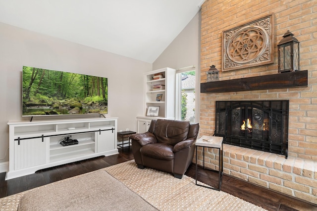 15726 Steamboat Ln, Houston, TX 77079 - living area with a fireplace, wood finished floors, baseboards, and high vaulted ceiling