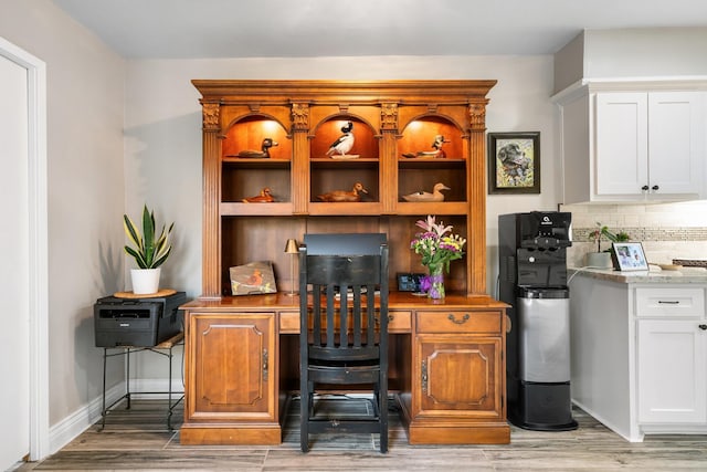 15726 Steamboat Ln, Houston, TX 77079 - home office with light wood-style floors and baseboards