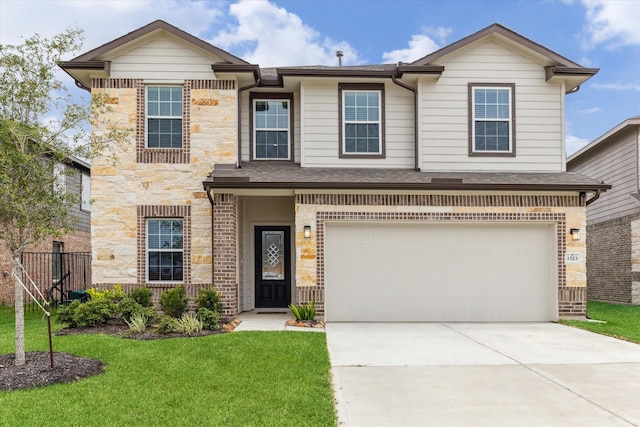 1523 Alpine Dr, Rosharon, TX 77583 - view of front of home with a garage, stone siding, concrete driveway, a front yard, and roof with shingles