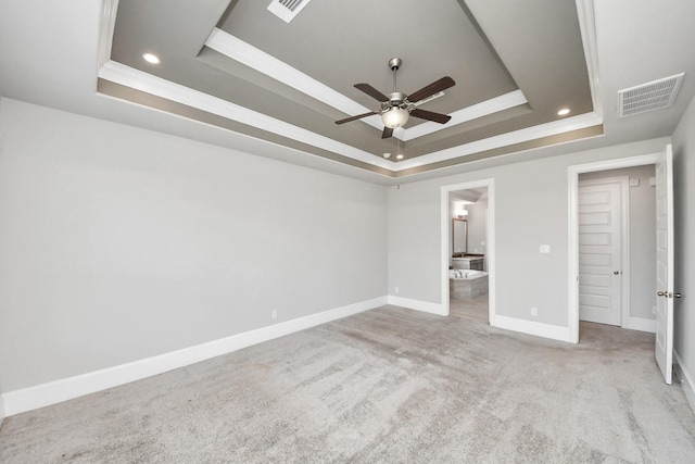 30702 Barred Owl Way, Brookshire, TX 77423 - unfurnished bedroom with a tray ceiling, baseboards, carpet flooring, recessed lighting, and crown molding