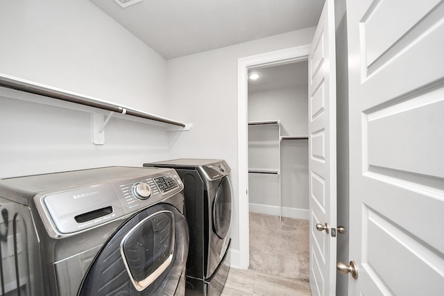 30702 Barred Owl Way, Brookshire, TX 77423 - laundry room with washer and dryer and baseboards