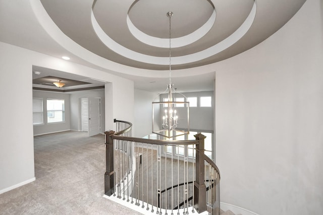 30702 Barred Owl Way, Brookshire, TX 77423 - stairway with a raised ceiling, a chandelier, baseboards, carpet floors, and recessed lighting