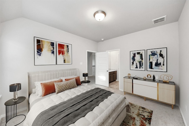 30702 Barred Owl Way, Brookshire, TX 77423 - bedroom featuring light colored carpet, baseboards, vaulted ceiling, and connected bathroom