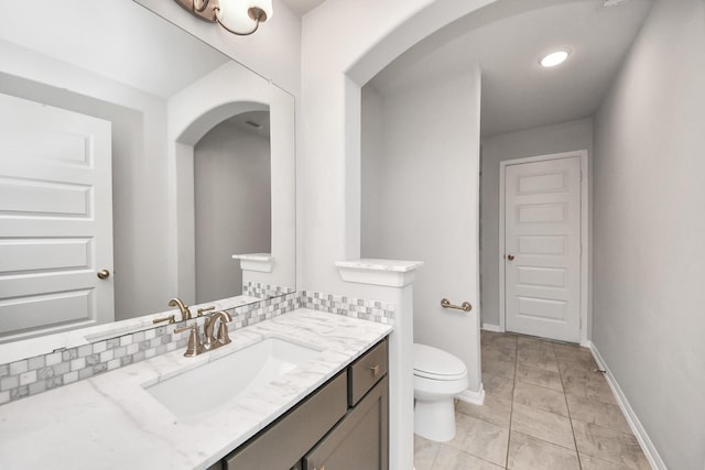 30702 Barred Owl Way, Brookshire, TX 77423 - bathroom with toilet, vanity, and baseboards