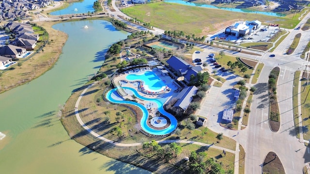 30702 Barred Owl Way, Brookshire, TX 77423 - aerial view of property's location with a nearby body of water and a pool
