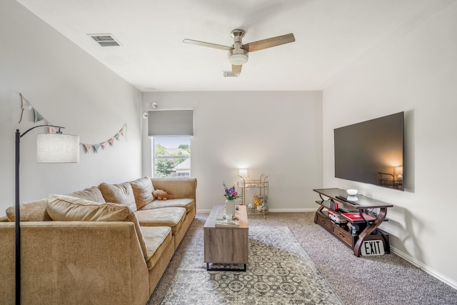 10522 Kirkwell Manor Ct, Spring, TX 77379 - living area featuring ceiling fan, carpet, and baseboards