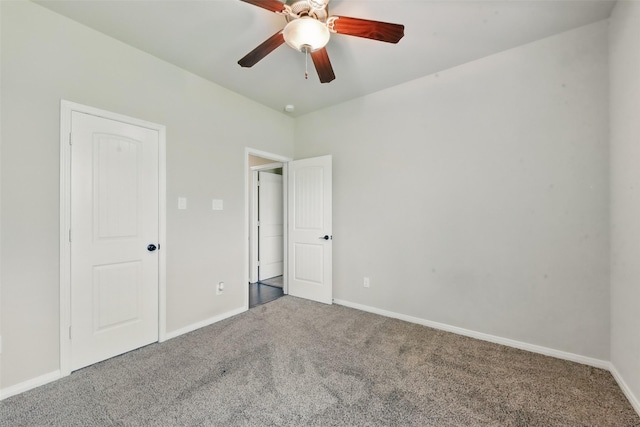 22907 Caverly Ln, Tomball, TX 77375 - unfurnished bedroom featuring carpet, baseboards, and ceiling fan