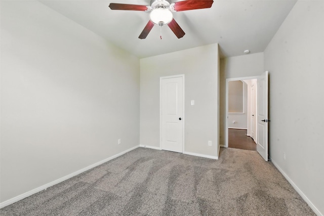 22907 Caverly Ln, Tomball, TX 77375 - unfurnished bedroom with carpet floors, baseboards, and a ceiling fan