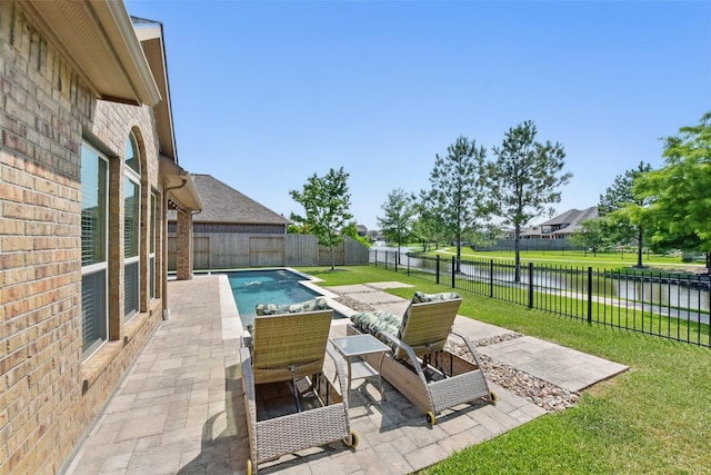 22907 Caverly Ln, Tomball, TX 77375 - view of patio / terrace with a water view