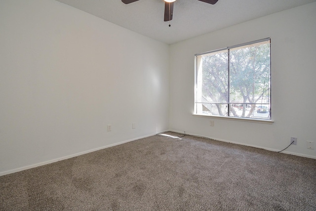 3206 Windchase Blvd Unit 471, Houston, TX 77082 - spare room featuring a ceiling fan, carpet flooring, and baseboards