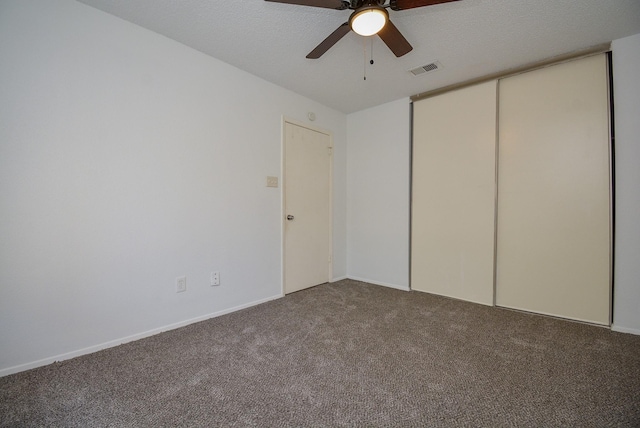 3206 Windchase Blvd Unit 471, Houston, TX 77082 - unfurnished bedroom featuring carpet, a closet, and ceiling fan