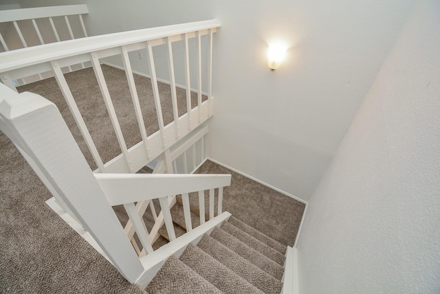 3206 Windchase Blvd Unit 471, Houston, TX 77082 - staircase featuring carpet floors