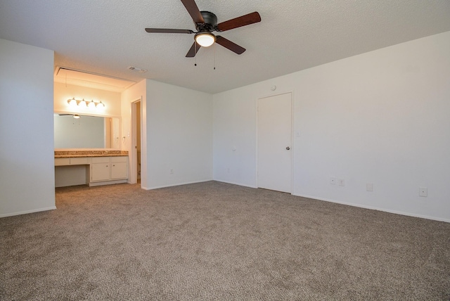 3206 Windchase Blvd Unit 471, Houston, TX 77082 - unfurnished bedroom featuring light colored carpet, attic access, ensuite bath, and baseboards