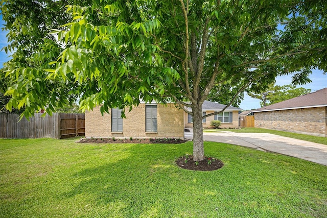 16631 Quiet Quail Dr, Missouri City, TX 77489 - view of property hidden behind natural elements with brick siding