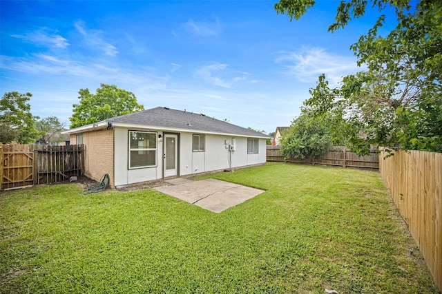 16631 Quiet Quail Dr, Missouri City, TX 77489 - back of house with a patio area and roof with shingles