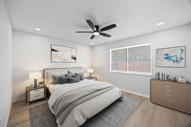 16631 Quiet Quail Dr, Missouri City, TX 77489 - bedroom with light wood-type flooring, baseboards, recessed lighting, and ceiling fan