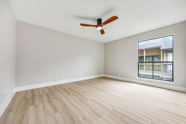 2829 Timmons Ln Unit 174, Houston, TX 77027 - unfurnished room featuring wood finished floors, ceiling fan, and baseboards