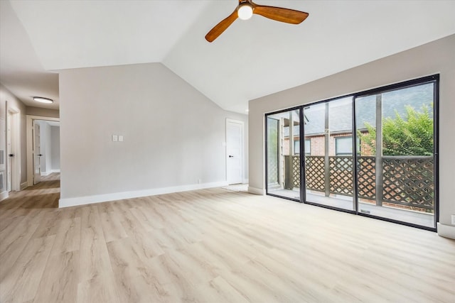 2829 Timmons Ln Unit 174, Houston, TX 77027 - unfurnished living room with a ceiling fan, light wood-style flooring, vaulted ceiling, and baseboards