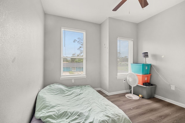 8534 Woodlyn Rd, Houston, TX 77028 - bedroom featuring wood finished floors and a ceiling fan