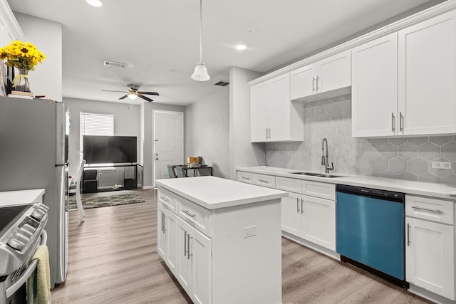 8534 Woodlyn Rd, Houston, TX 77028 - kitchen with dishwasher, electric stove, recessed lighting, backsplash, and light wood finished floors