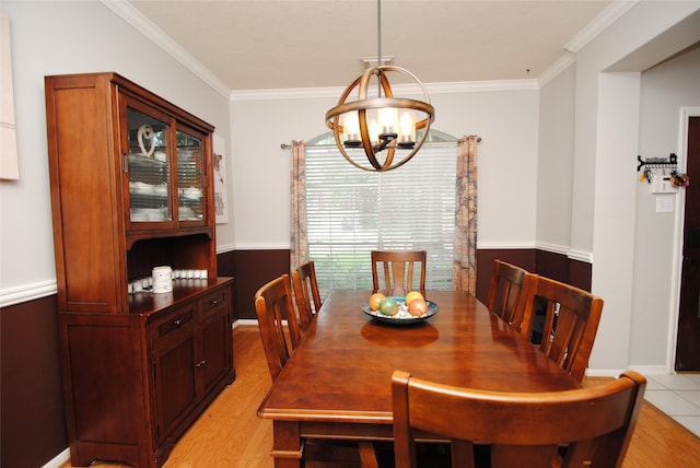 9723 Therrell Dr, Houston, TX 77064 - dining space featuring a chandelier, ornamental molding, and light wood finished floors