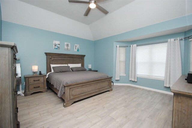 9723 Therrell Dr, Houston, TX 77064 - bedroom with lofted ceiling, light wood-style flooring, a ceiling fan, and baseboards