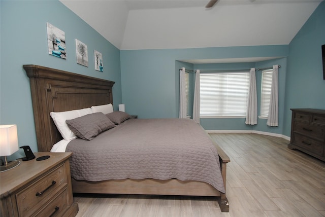 9723 Therrell Dr, Houston, TX 77064 - bedroom with vaulted ceiling, light wood finished floors, baseboards, and a ceiling fan