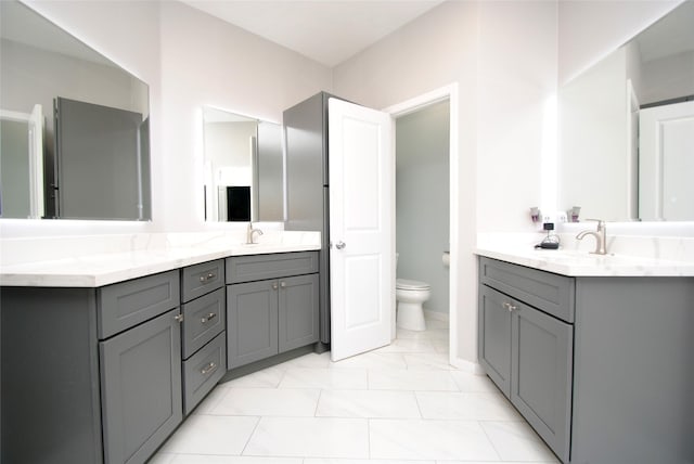 9723 Therrell Dr, Houston, TX 77064 - full bath featuring vanity, toilet, and marble look tiles