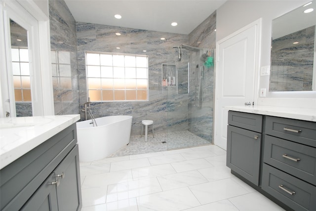 9723 Therrell Dr, Houston, TX 77064 - bathroom with vanity, a marble finish shower, a freestanding tub, recessed lighting, and tile walls