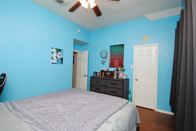 9723 Therrell Dr, Houston, TX 77064 - bedroom featuring dark wood-style flooring, baseboards, and a ceiling fan