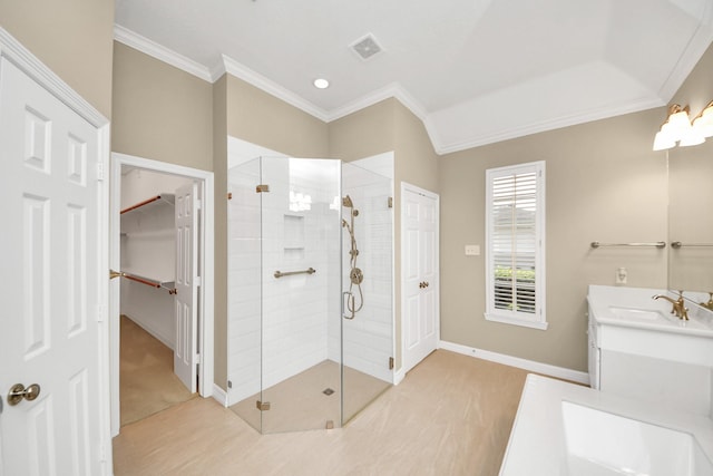22127 Glen Arden Ln, Katy, TX 77450 - full bathroom with ornamental molding, a shower stall, wood finished floors, baseboards, and vanity