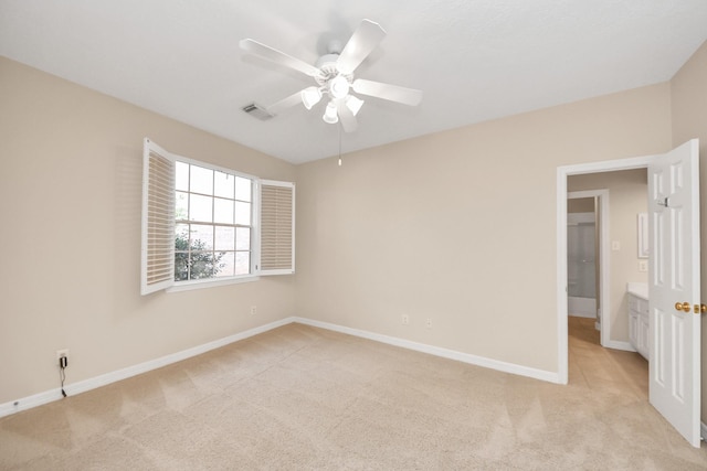 22127 Glen Arden Ln, Katy, TX 77450 - unfurnished bedroom featuring light colored carpet, baseboards, and ceiling fan