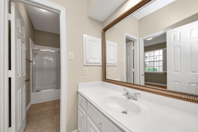 22127 Glen Arden Ln, Katy, TX 77450 - full bathroom with vanity, tile patterned flooring, and combined bath / shower with glass door