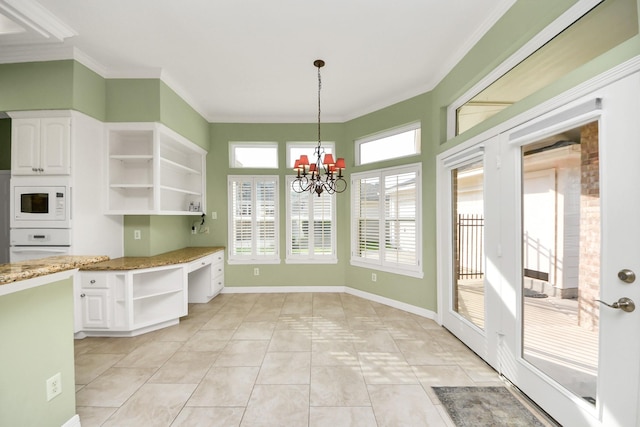 22127 Glen Arden Ln, Katy, TX 77450 - kitchen featuring open shelves, white cabinets, ornamental molding, white appliances, and a chandelier
