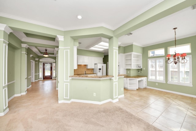 22127 Glen Arden Ln, Katy, TX 77450 - kitchen featuring open shelves, white refrigerator with ice dispenser, light tile patterned flooring, white cabinetry, and crown molding
