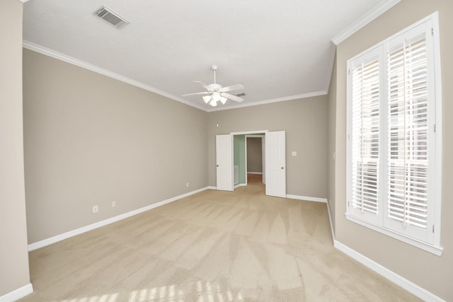 22127 Glen Arden Ln, Katy, TX 77450 - unfurnished room with a ceiling fan, ornamental molding, carpet, and baseboards
