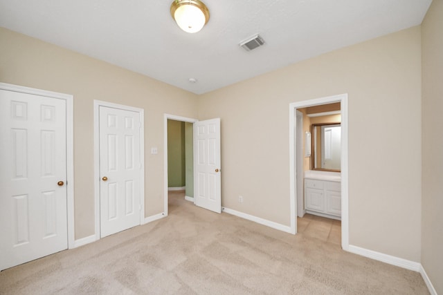 22127 Glen Arden Ln, Katy, TX 77450 - unfurnished bedroom with light colored carpet, baseboards, and connected bathroom
