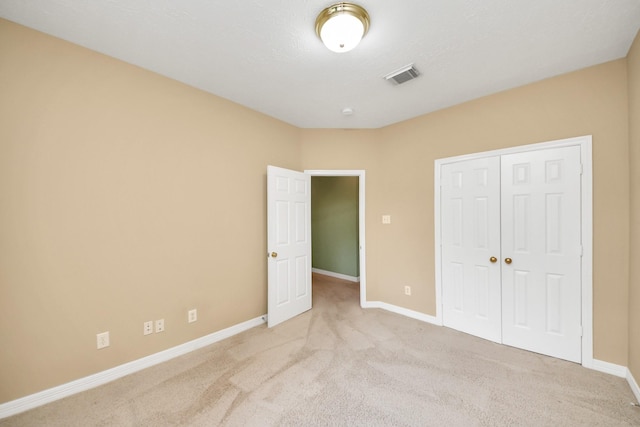 22127 Glen Arden Ln, Katy, TX 77450 - unfurnished bedroom featuring carpet floors, baseboards, and a closet