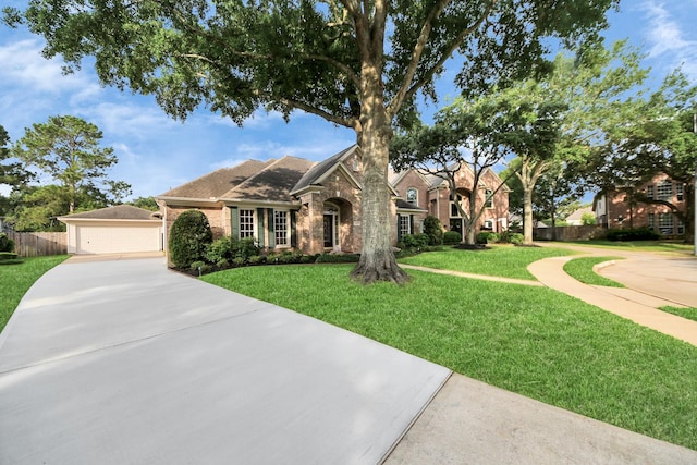 22127 Glen Arden Ln, Katy, TX 77450 - view of front of home with brick siding and a garage