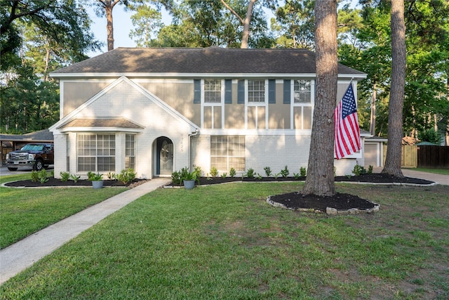 17426 Pinewood Forest Dr, Spring, TX 77379 - view of front facade with brick siding and roof with shingles