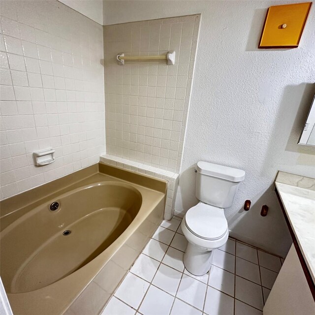 16800 Sugar Pine Dr Unit C21, Houston, TX 77090 - bathroom with vanity, a bath, toilet, and tile patterned flooring