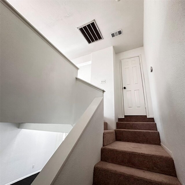 16800 Sugar Pine Dr Unit C21, Houston, TX 77090 - stairs with baseboards