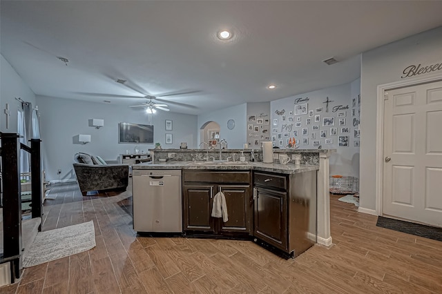 2827 Silver Charm, Houston, TX 77014 - kitchen with a sink, dishwasher, light wood-type flooring, dark brown cabinetry, and ceiling fan