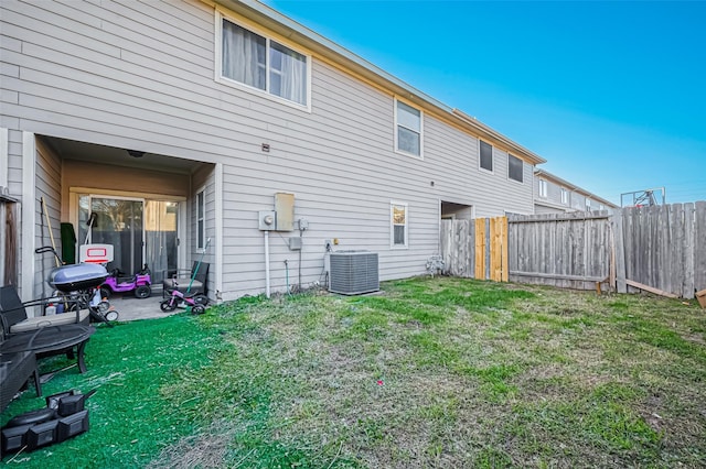 2827 Silver Charm, Houston, TX 77014 - rear view of house with central AC unit