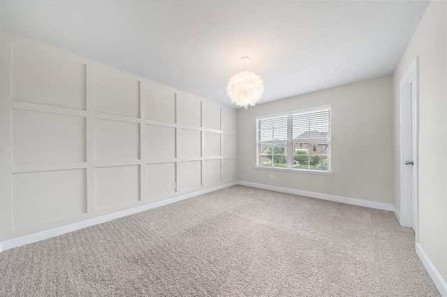 28911 Copper Break Ct, Katy, TX 77494 - spare room with a chandelier, light carpet, and baseboards