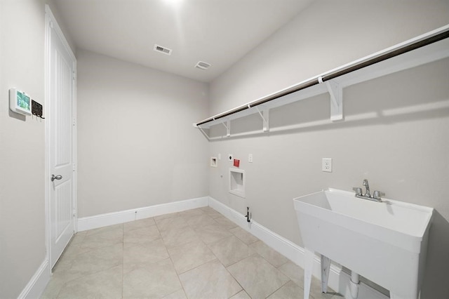 28911 Copper Break Ct, Katy, TX 77494 - washroom with washer hookup, electric dryer hookup, hookup for a gas dryer, and baseboards