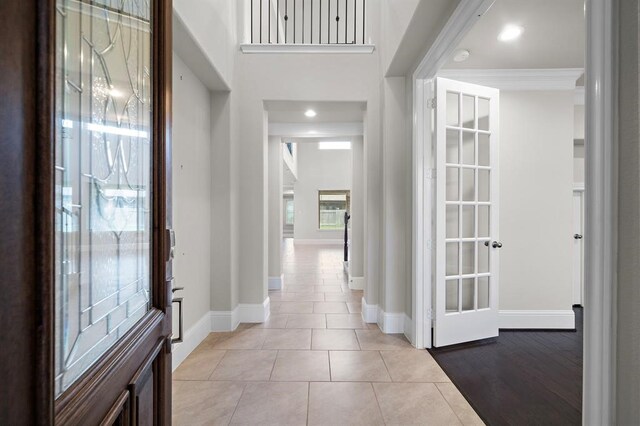 28911 Copper Break Ct, Katy, TX 77494 - entryway featuring baseboards, light tile patterned flooring, and recessed lighting