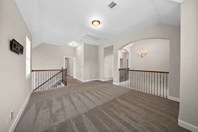 4021 Windsor Chase Dr, Spring, TX 77386 - carpeted spare room with attic access, lofted ceiling, arched walkways, baseboards, and a chandelier