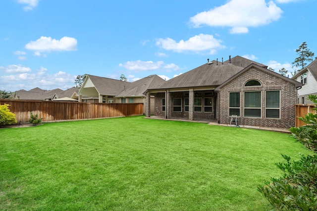 4021 Windsor Chase Dr, Spring, TX 77386 - back of house with brick siding, a patio area, and a shingled roof