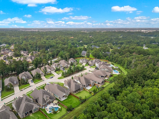 4021 Windsor Chase Dr, Spring, TX 77386 - aerial overview of property's location with nearby suburban area and a heavily wooded area
